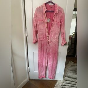 FREE PEOPLE jumpsuit. Never worn, new with tags. Size M.